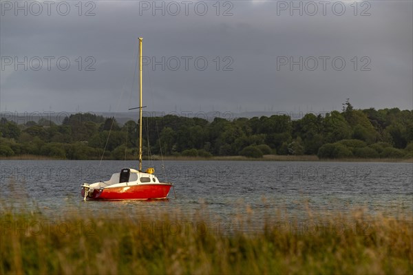 Sailing boat with strong red colour