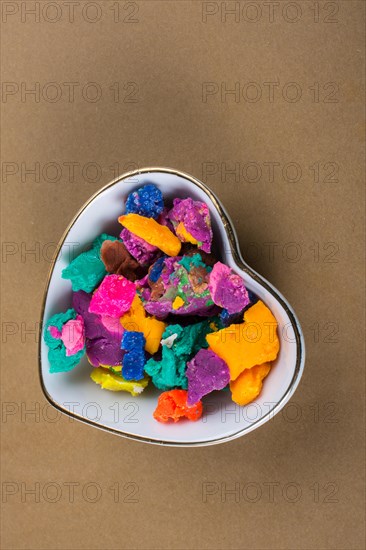 Dry colorful play dough in smal pieces