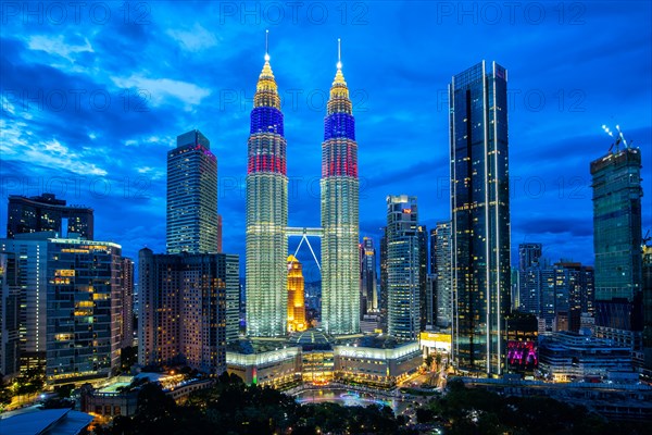 Petronas Twin Towers skyscrapers KLCC skyline in the evening of Kuala Lumpur