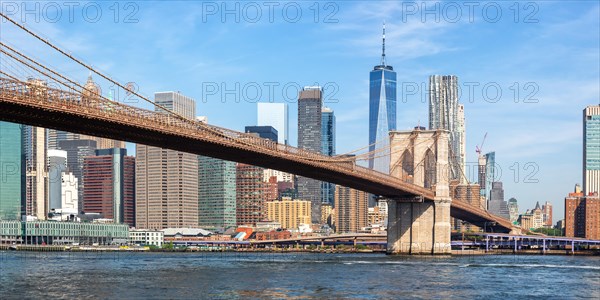 New York City Manhattan skyline with Brooklyn Bridge and World Trade Center skyscraper panorama in New York