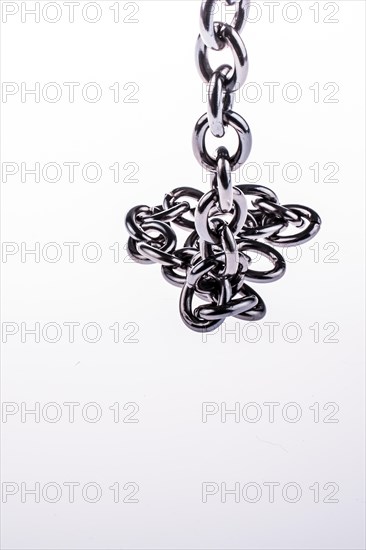 Metal chain on white background