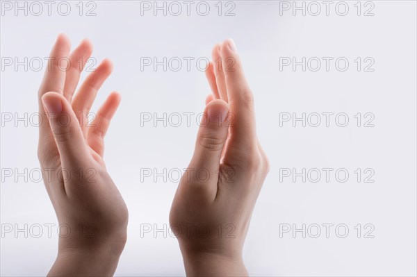 Hand holding on a white background