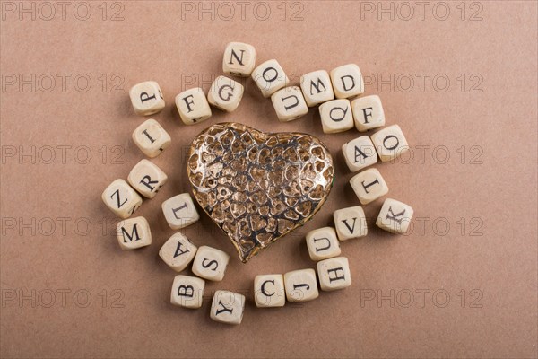 Metal Love icon and Letter cubes of made of wood