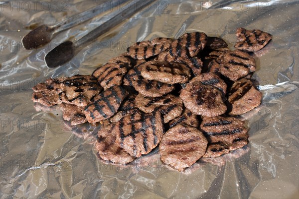 Turkish minced meatballs are on the grilled to be cooked