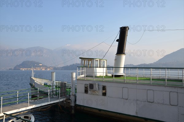 Steamship and Village bellagio on an Alpine Lake Como in Lombardy