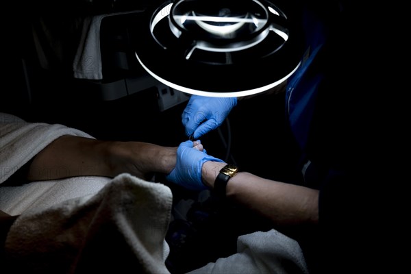 Woman Making Pedicure on Her Foot in Switzerland