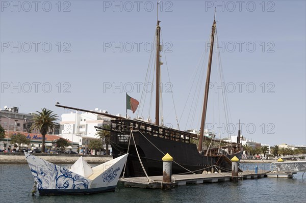 Advertising for the Centro Ciencia Viva de Lagos and museum ship Caravel Boa Esperanca in the port of Lagos