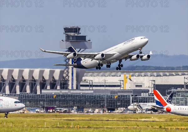 Taking off Airbus A340-300 of the airline Lufthansa