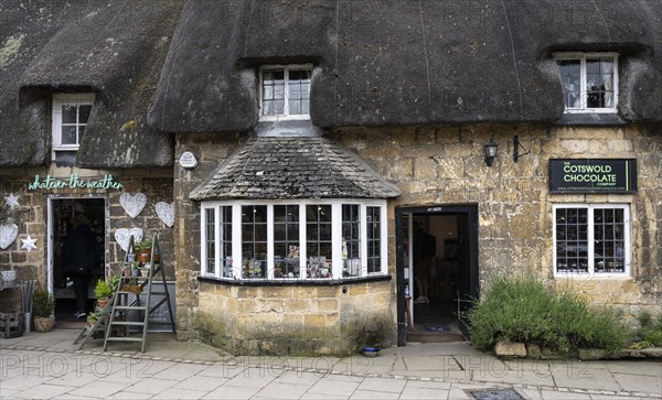 Historic stone houses with thatched roofs in detail