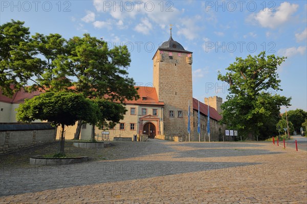 Moated castle built 12th century with tower