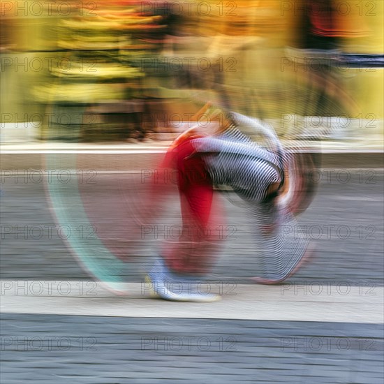 Colourful clown doing a cartwheel