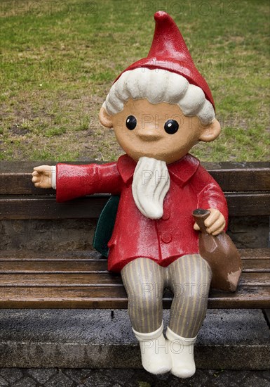 Sculpture of the Sandman on a bench