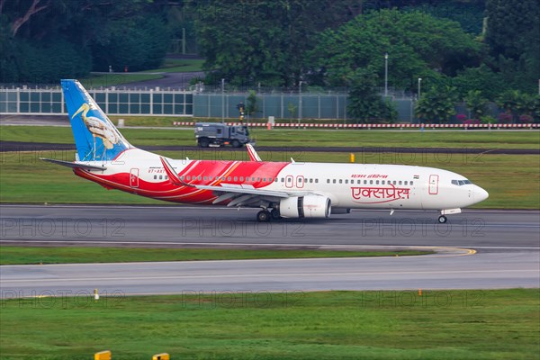 An Air India Express Boeing 737-800 aircraft with registration VT-AXT at Changi Airport