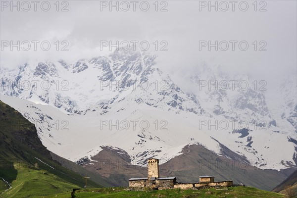 Lamaria Church against a mountain backdrop