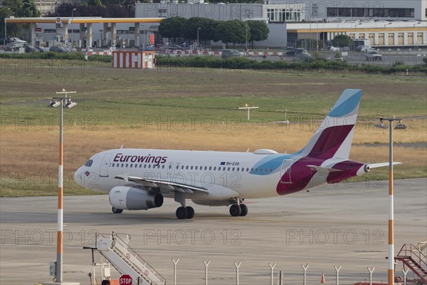 Passenger aircraft Airbus A319-132 of the airline Eurowings on the tarmac at Hamburg Airport