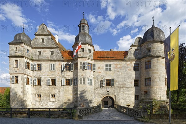 North-west side of Mitwitz moated castle with stone bridge and entrance portal