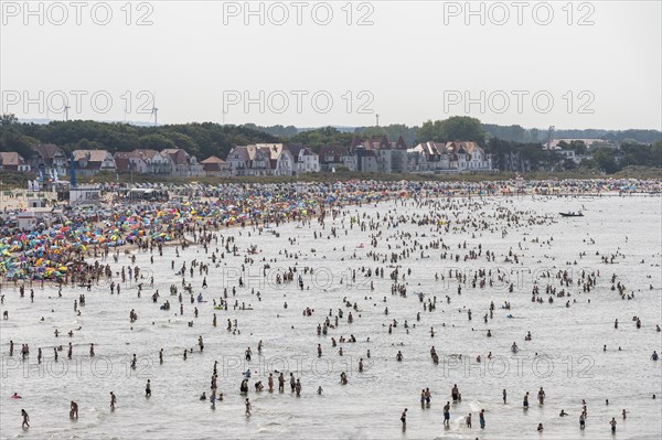 Crowds on the beach and in the sea