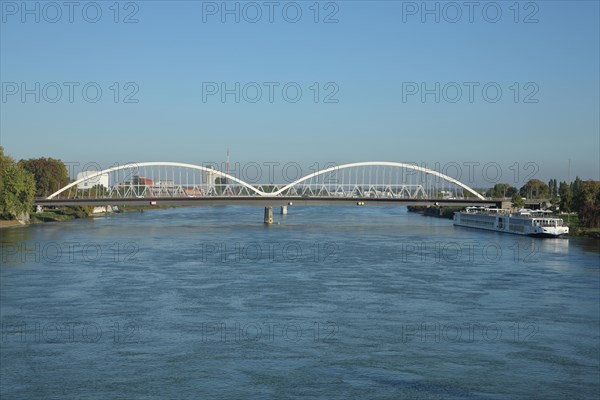 View of the Europabruecke from the Passerelle des Deux Rives with Rhine and passenger ship