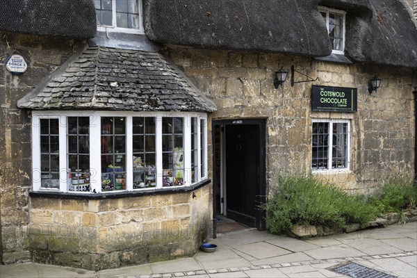 Historic stone houses with thatched roofs in detail