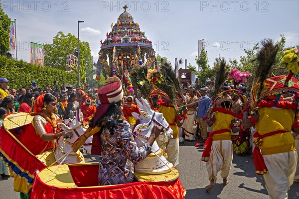 Dancing Hindus on the main festival day at the big parade Theer