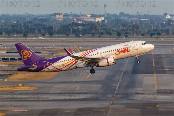 A Thai Smile Airbus A320 aircraft with registration HS-TXS at Bangkok Suvarnabhumi Airport