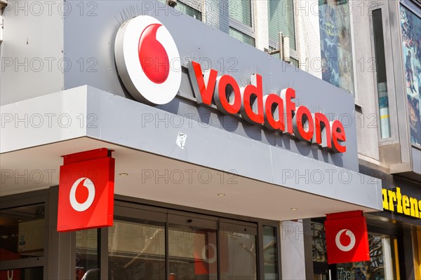 Shop of the brand Vodafone with logo telephone communication internet provider at Koenigstrasse in Stuttgart