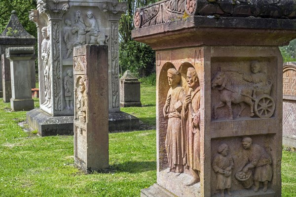 Reconstructed funeral pillars and steles at the Gallo-Roman necropolis at the open-air Archeosite and Museum of Aubechies-Beloeil