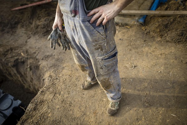 Dirty and tattered dungarees of a construction worker. Berlin