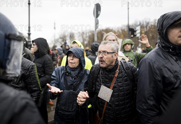 Demonstrators protest against the reform of the infection protection law