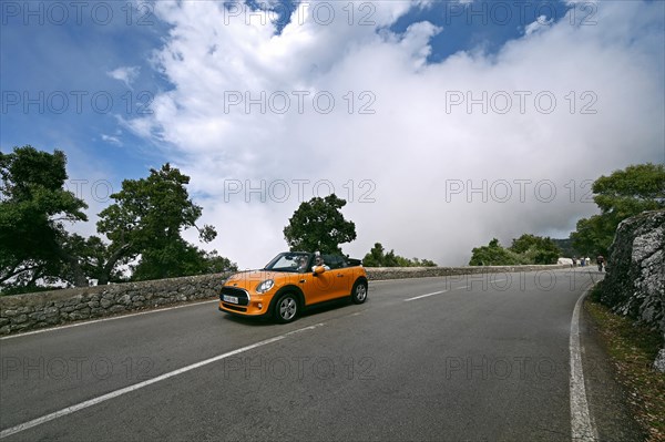 Mini Cooper Convertible on the Ma10 road in the Tramuntana Mountains