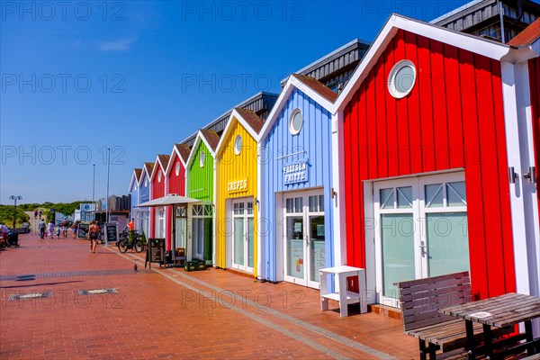 Colourful wooden houses with shops and restaurants on the North Sea island of Langeoog. Lower Saxony
