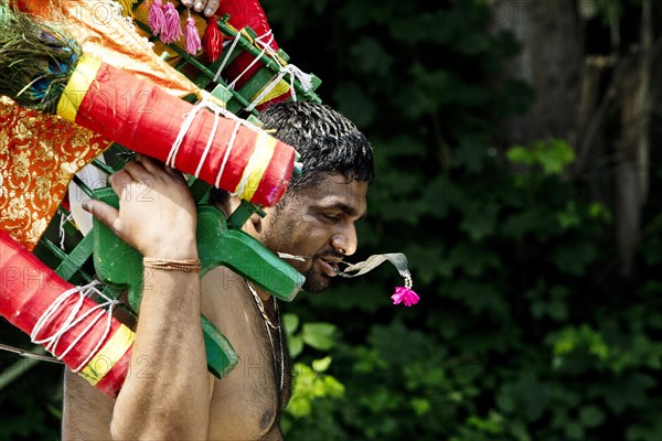 Hindus on the main festival day at the temple festival in front of the Hindu temple Sri Kamadchi Ampal