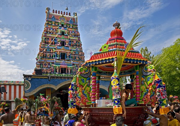 Hindus on the main festival day at the temple festival in front of the Hindu temple Sri Kamadchi Ampal