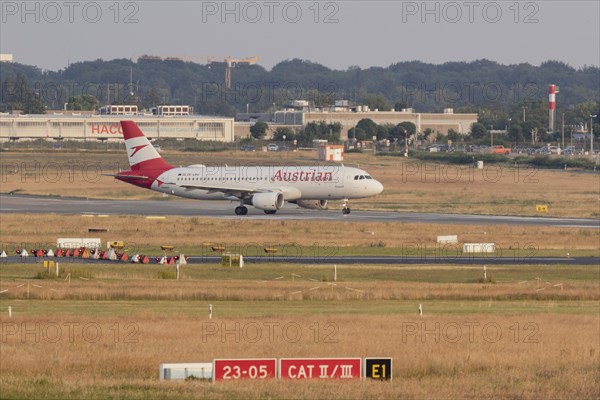 Passenger aircraft Airbus A320-214 of Austrian Airlines on the tarmac at Hamburg Airport