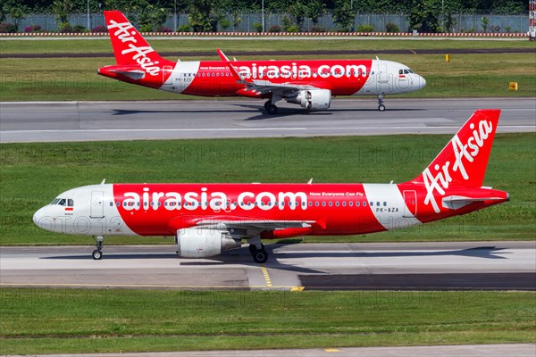 Airbus A320 aircraft of Indonesia AirAsia with registration PK-AZA at Changi Airport