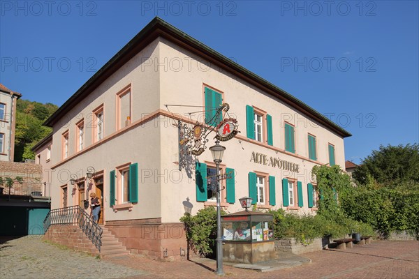 Old pharmacy with nose plate and inscription