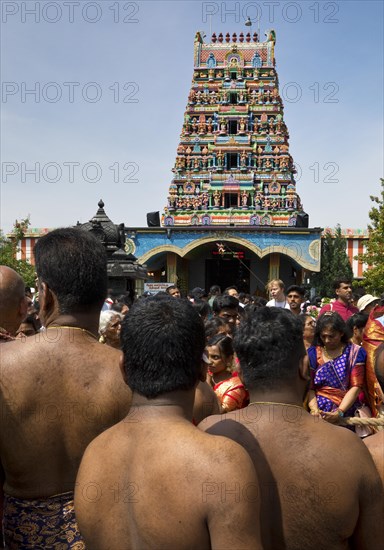 Hindus on the main festival day at the temple festival in front of the Hindu temple Sri Kamadchi Ampal