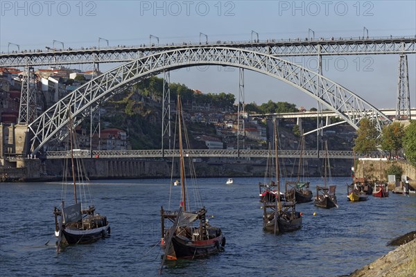 Historic barges with port wine barrels on the Douro River