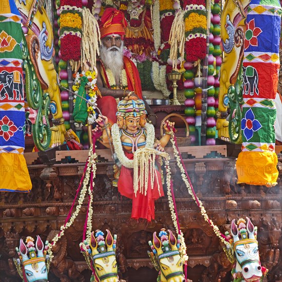 Priest Arumugam Paskaran at the main festival day during the big procession Theer