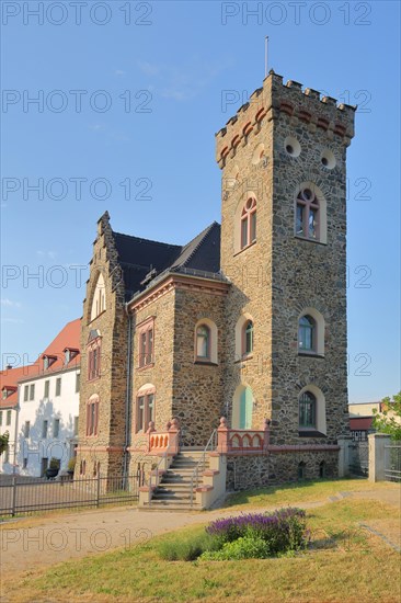 Romanesque castle built c. 12th century and tower with battlements