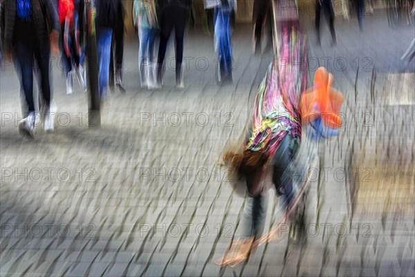 Colourful clown beats a wheel