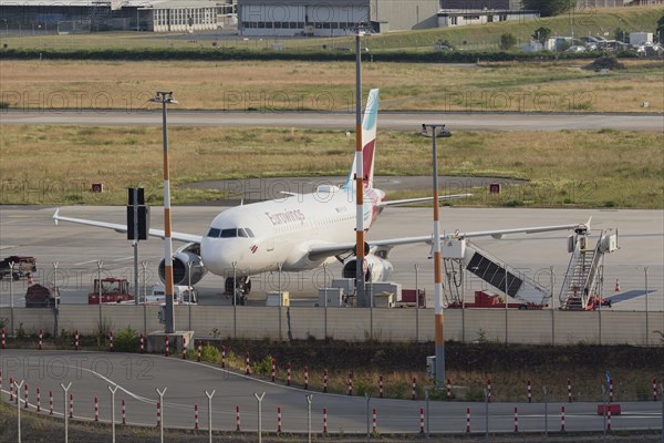 Passenger aircraft Airbus A319-132 of the airline Eurowings on the tarmac at Hamburg Airport