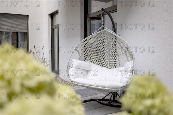 Hanging swing on the terrace of a luxury flat in Berlin