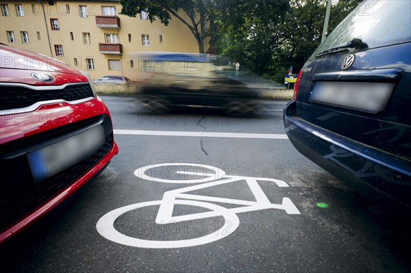 Cars park on a cycle path in Ollenhauerstrasse in Berlin Reinickendorf. The new transport administration in Berlin has stopped several cycle path projects in Berlin. Berlin