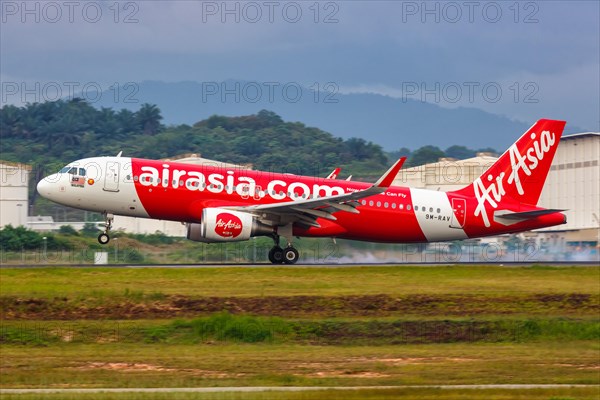 An AirAsia Airbus A320 aircraft with registration number 9M-RAV at Kuala Lumpur Airport