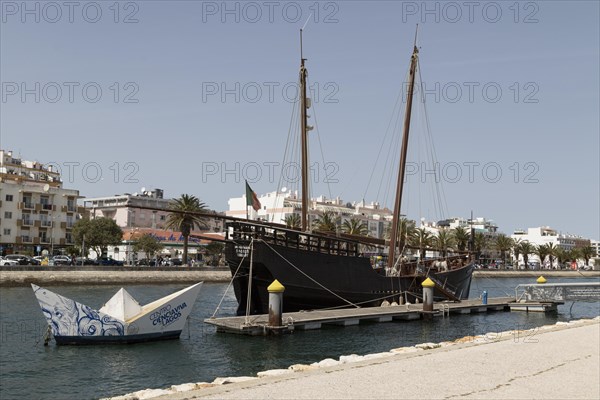 Advertising for the Centro Ciencia Viva de Lagos and museum ship Caravel Boa Esperanca in the port of Lagos