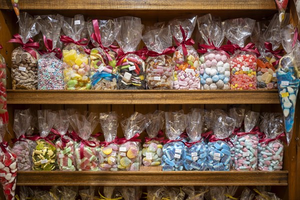 Sweets packed in plastic bags and placed on a shelf