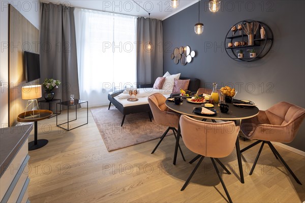 Bedroom and dining room in a luxury flat in Berlin