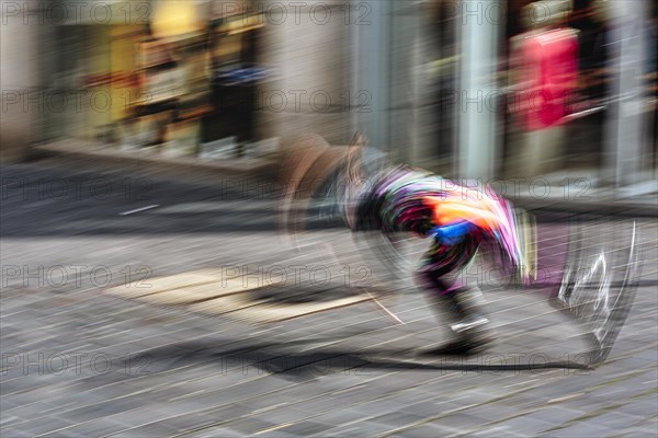 Colourful clown doing a cartwheel