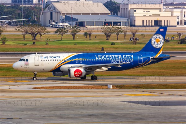 A Thai AirAsia Airbus A320 aircraft with registration HS-ABV and Leicester City Football Club special livery at Bangkok Don Mueang Airport